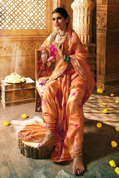 Soft orange peach designer banarasi saree with embroidered silk blouse