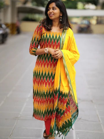 Ikkath suit is vibrant colors and geometric or traditional designs