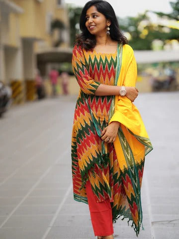Ikkath suit is vibrant colors and geometric or traditional designs