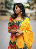 Ikkath suit is vibrant colors and geometric or traditional designs