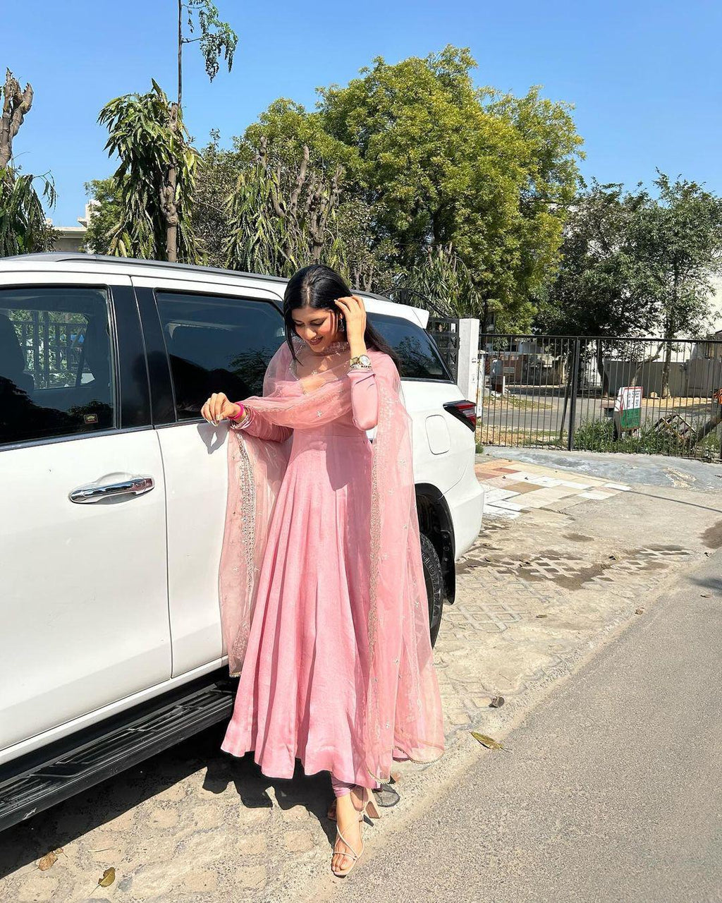 Alluring Sky Peach Color Heavy Work Gown Designs