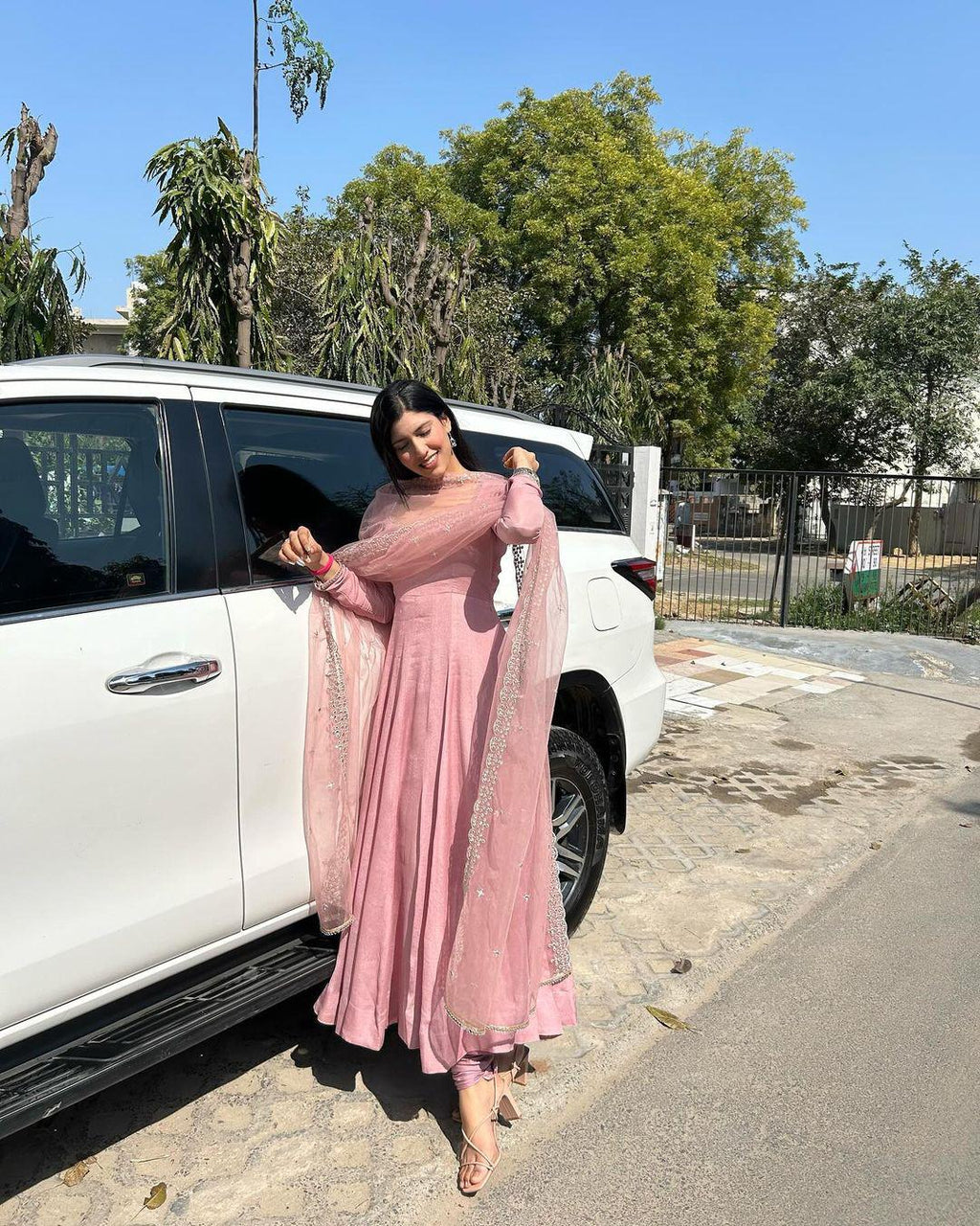Alluring Sky Peach Color Heavy Work Gown Designs