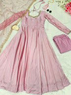 Alluring Sky Peach Color Heavy Work Gown Designs