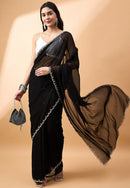 Sequin Embroidered Georgette Party Wear Saree with Contrast Border