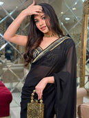 Designer One piece Black colored Silk Saree with golden work border  for causal wear